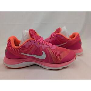 Nike Dual Fusion X2 running shoes in a vibrant pink and orange colorway.